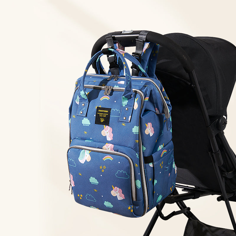 Wide diaper outlet backpack